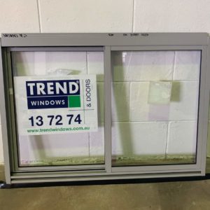 silver sliding window 600mm high by 910mm wide